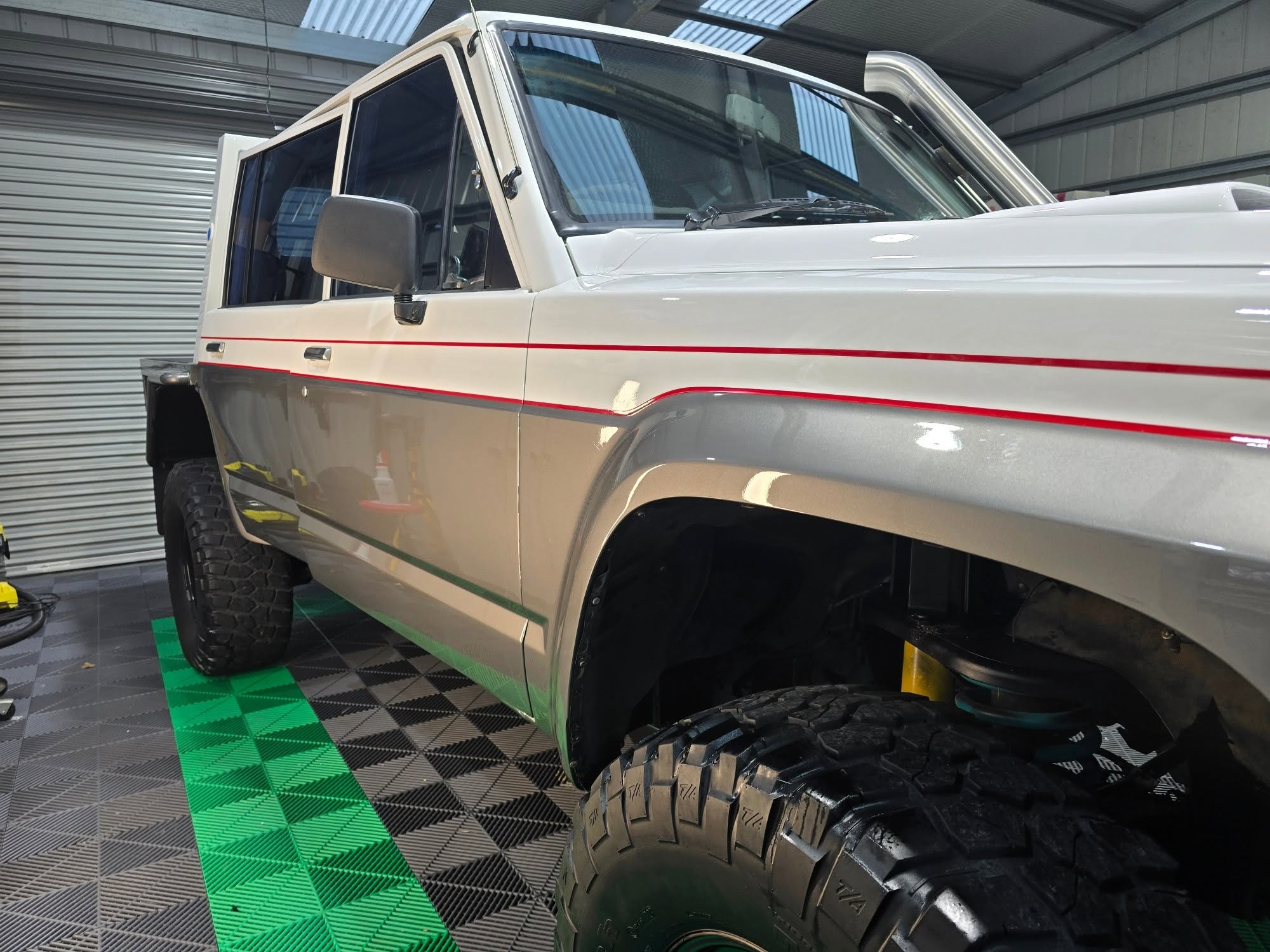 Nissan Patrol GQ in studio under skylight