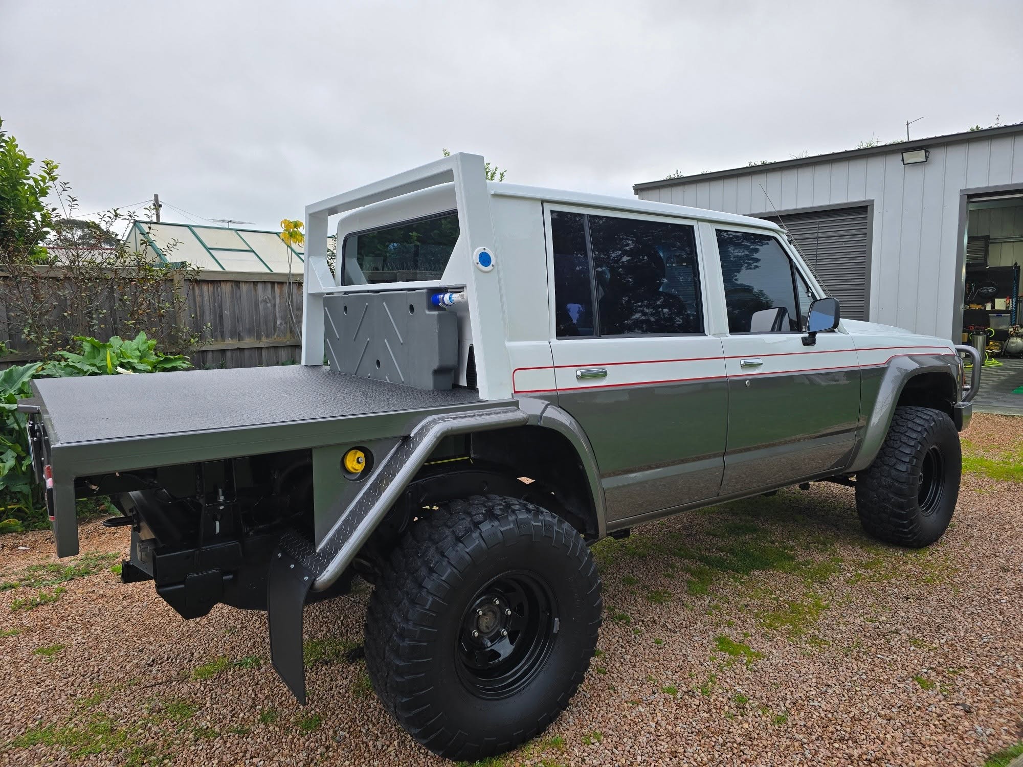 Nissan Patrol GQ flat-tray rear three-quarter